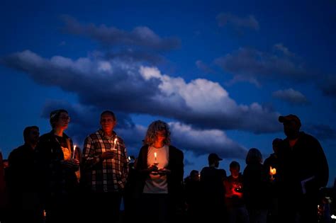 Residents of Maine gather to pray and reflect, four days after a mass shooting left 18 dead
